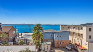 Stunning ocean views from this coastal neighborhood, featuring two-story homes with balconies and a quiet, residential atmosphere.