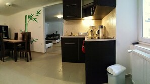 Fridge, microwave, toaster, cookware/dishes/utensils