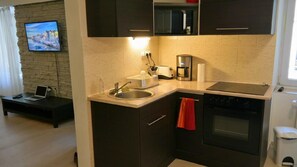 Fridge, microwave, toaster, cookware/dishes/utensils