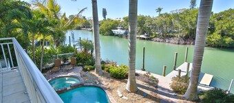 Luxury waterfront home with a heated pool and spa!