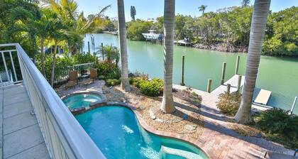 Luxury waterfront home with a heated pool and spa!