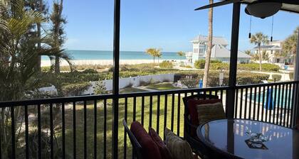 Gulf-front, heated pool, stocked kitchen, and private parking!