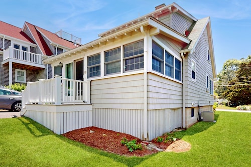 Coastal dog-friendly cottage near Hen Cove with sunroom, beach access, & games