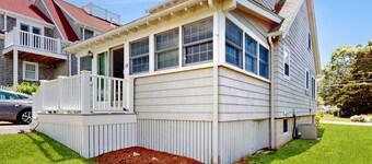 Coastal dog-friendly cottage near Hen Cove with sunroom, beach access, & games