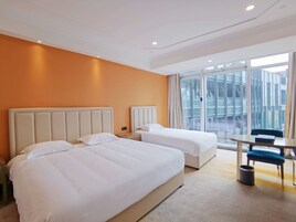 Family Twin Room | Premium bedding, blackout drapes, free WiFi, bed sheets