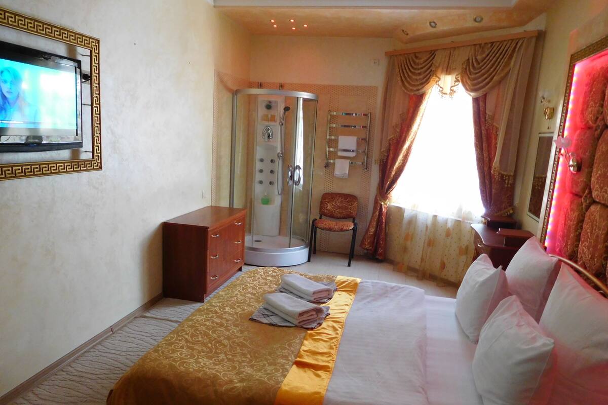 Deluxe Apartment, Jetted Tub | Minibar, desk, soundproofing, iron/ironing board