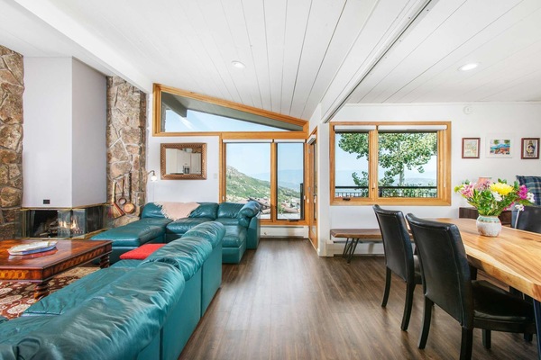 Spacious and inviting sofas and incredible views greet you as you enter the living area of this wonderful condo.