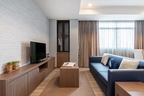 Kamar Eksklusif, 2 kamar tidur | Area keluarga | Televisi LED 32-inci dengan saluran TV kabel dan TV