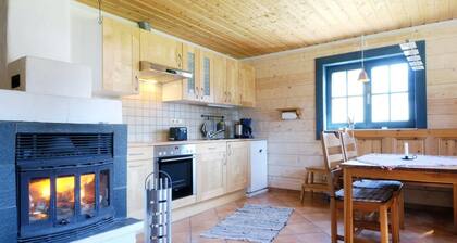 Cosy log house with fireplace in Oviksfjäll