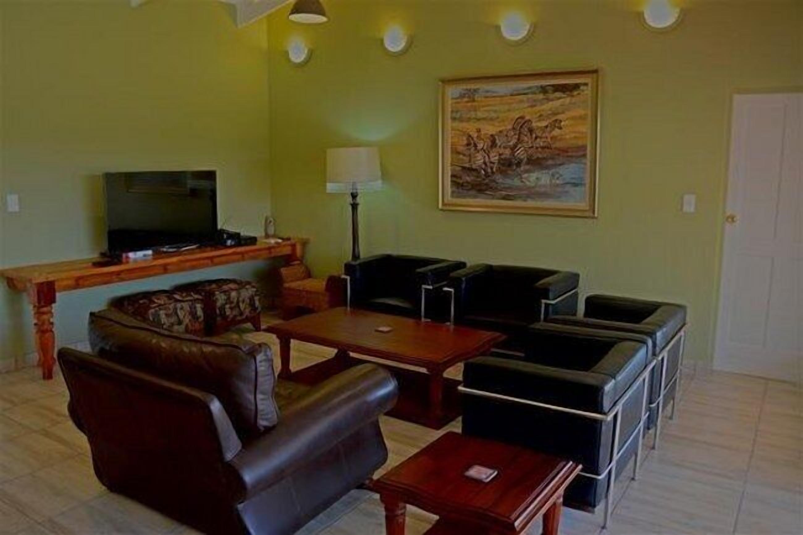 Deluxe Chalet, 2 Bedrooms | Living area | TV