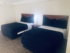 Premium bedding, down comforters, pillowtop beds, individually decorated