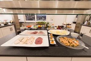 A buffet with various dishes including seafood, salads, and desserts. - Hotel Nuhnetal (Winterberg)