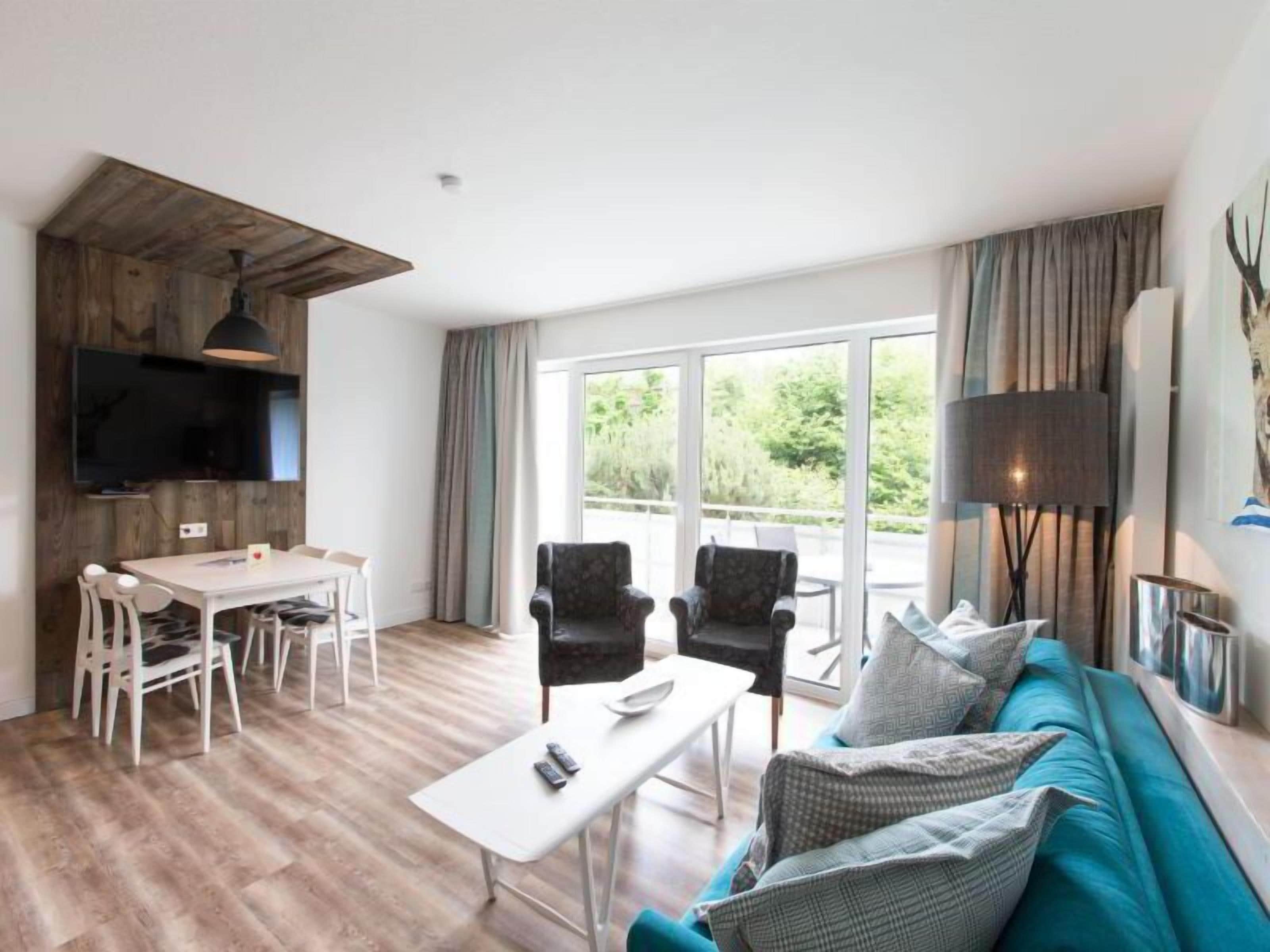 Comfort appartement, Meerdere bedden | Een kluis op de kamer, individueel gedecoreerd, individueel gemeubileerd