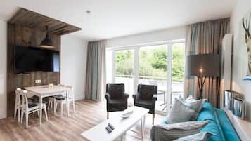 Comfort appartement, Meerdere bedden | Een kluis op de kamer, individueel gedecoreerd, individueel gemeubileerd