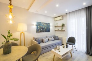 Apartment, 1 Bedroom | Living room | Smart TV