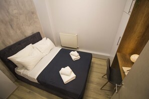 Apartment, 1 Bedroom | 1 bedroom, premium bedding, laptop workspace, iron/ironing board