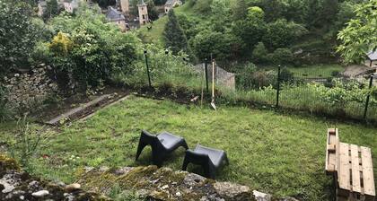 "Maisondeltraouc" gîte with roof terrace and garden offering stunning views.