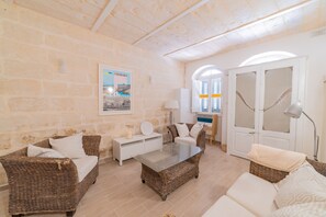 Apartment, 1 Bedroom | Living area | 32-inch LCD TV with cable channels, TV