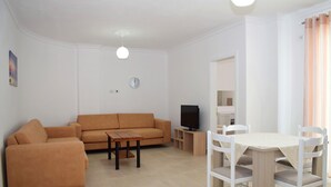 Room 107 | Living area | Flat-screen TV - Best summer apartment (Golem)