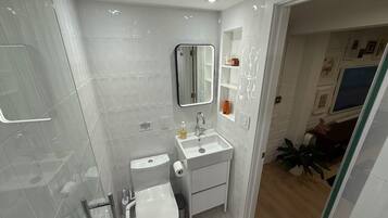 Shower, eco-friendly toiletries, hair dryer, bidet