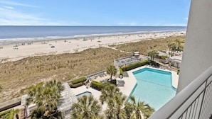 A pool with a view of the beach and ocean. - Oceanfront Penthouse Villa w/ Balcony, Hilton Head (Hilton Head Island)