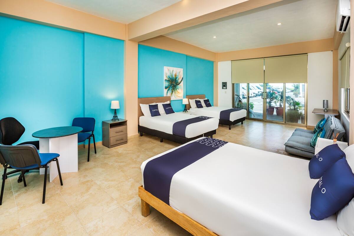 Habitación estándar (3 Double Beds) | Ropa de cama