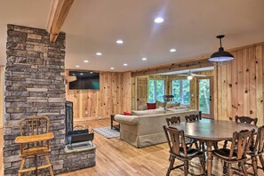 TV, fireplace - Rustic Sunset Escape on 67 Acres: Outdoor Kitchen (Sunset)