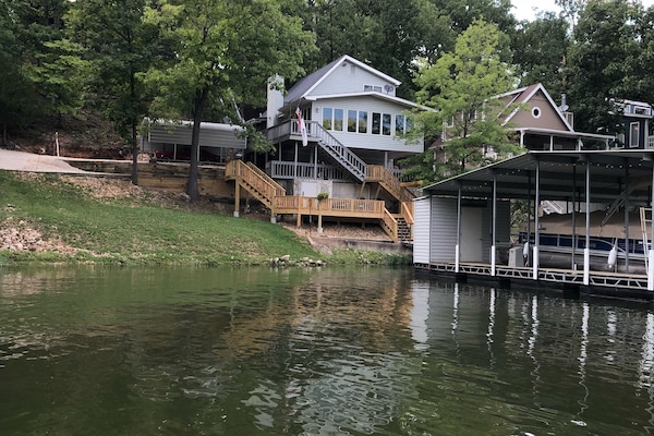 View of the house  and property from the water