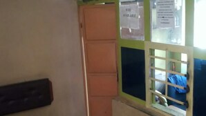 A room with a bench, a window with a view, and a door. - Bidii Bar & Restaurant (Mai Mahiu)