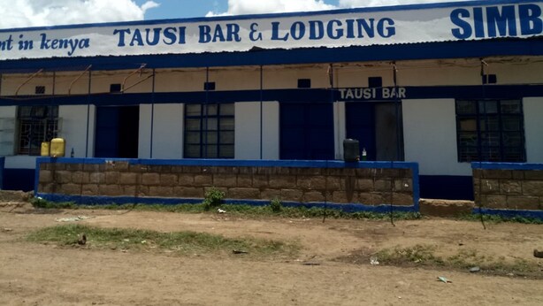 A building with a sign reading "TAUSI BAR & LODGING SIMBA". - Tausi Bar & Lodging (Nakuru)