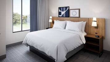 A hotel room with a large bed, two bedside tables, a window with curtains, and two wall-mounted lamps.