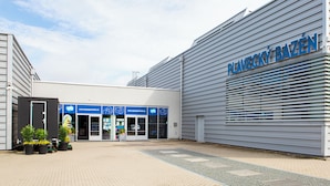 A modern building with a sign reading "PLAVECKÝ BAZÉN". - HOTEL CHODOV ASC (Prague)
