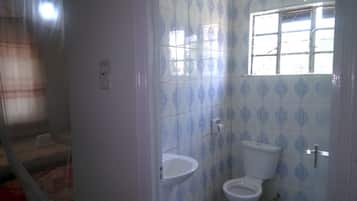 Twin Room | Bathroom | Shower, towels, soap, toilet paper