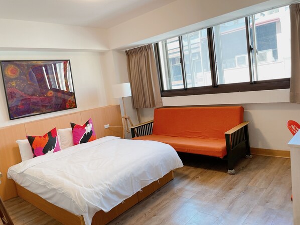 Deluxe Quadruple Room, 2 Double Beds (No parking) | Premium bedding, desk, blackout drapes, free WiFi - Huru House (Taichung)