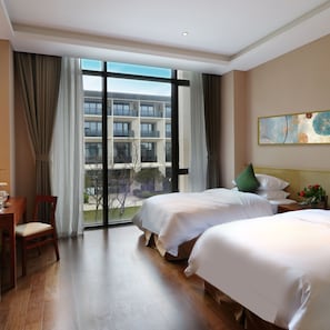 Habitación Deluxe con 2 camas individuales, para no fumadores, vista al jardín | Cortinas blackout, wifi gratis y ropa de cama