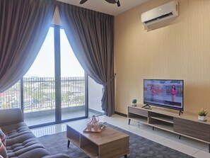 LS206 Superior City View | Living room | 40-inch LED TV with cable channels, TV - Luminari Suite by Homez Suite (Butterworth)