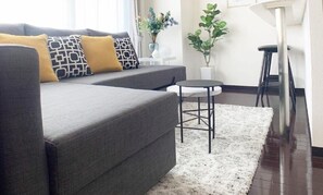 ファミリールーム バルコニー付 901号室 | リビング エリア