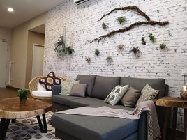 Tropical 2BR Apartment - Essential Travelers Only | Living room | LED TV