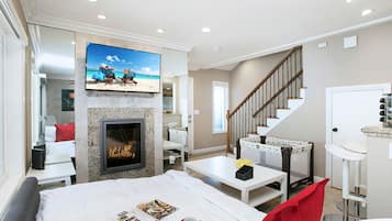 Apartment (2 Bedrooms) | Living room | 50-inch TV with cable channels, Netflix, toys
