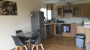 Fridge, microwave, oven, stovetop - 2 Bedroom Riverside Penthouse Apartment Little Paxton St Neots (Saint Neots)