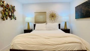 2 habitaciones, tabla de planchar con plancha, cuna de viaje y wifi