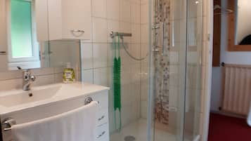 Een douche, een haardroger, zeep
