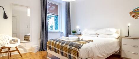 1 غرفة نوم ومكواة/لوح كي وواي فاي مجانًا وملاءات أسرّة