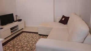 Apartamento, 1 habitación | Zona de estar