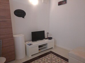 Appartement, 1 chambre | Aire de séjour