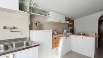 Fridge, electric kettle, highchair, cookware/dishes/utensils