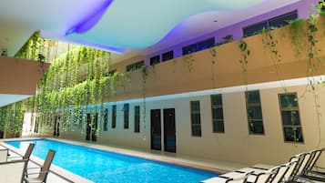 Indoor pool, open 8:00 AM to 9:00 PM, pool loungers