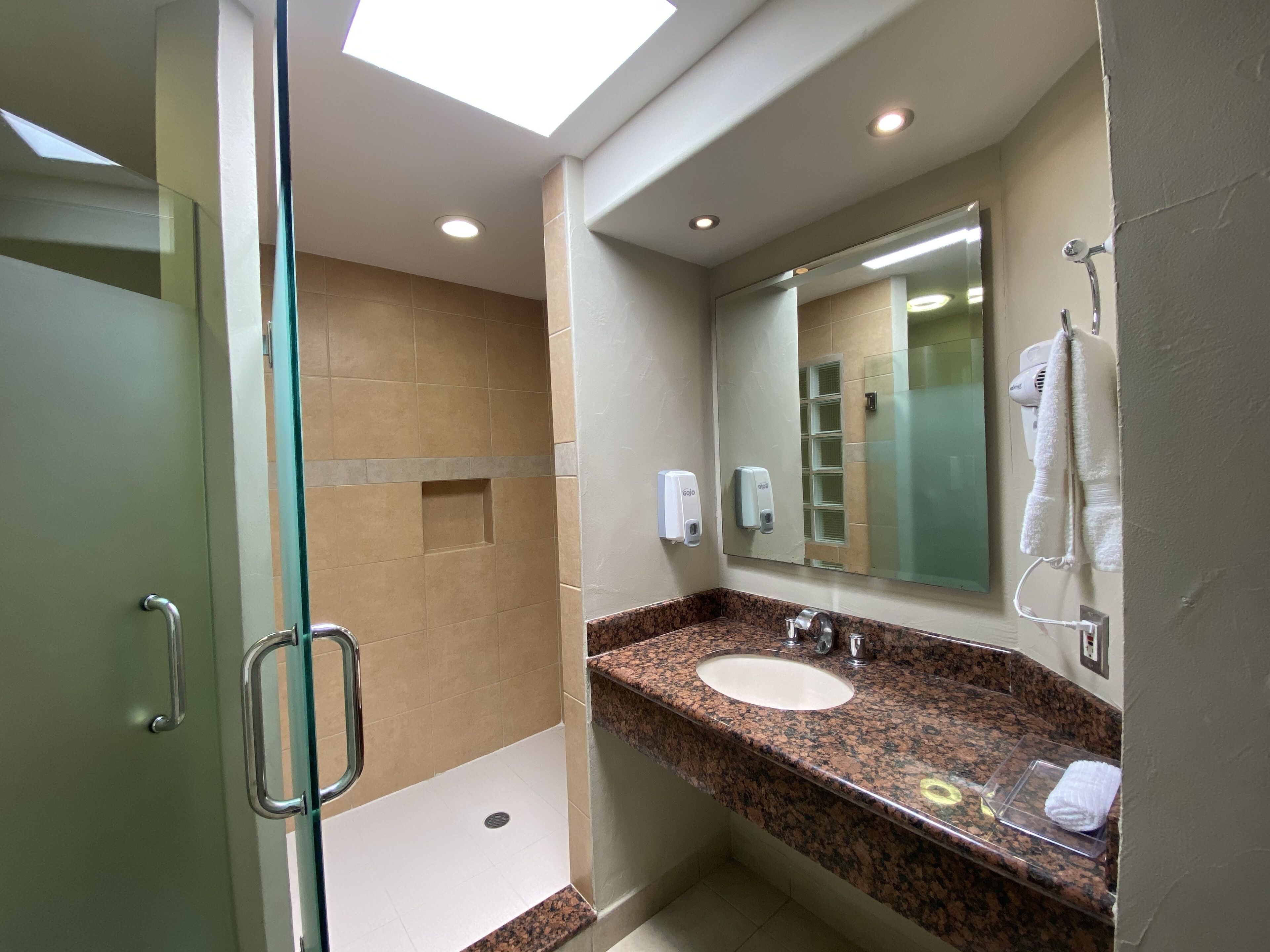 Suite, Multiple Beds | Bathroom | Shower, towels, soap, shampoo