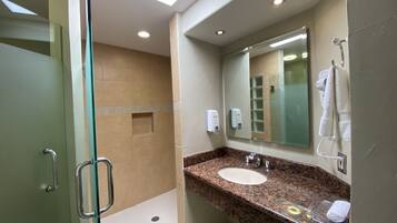 Suite, Multiple Beds | Bathroom | Shower, towels, soap, shampoo