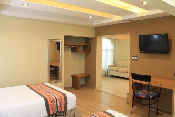 Suite, Multiple Beds | Television